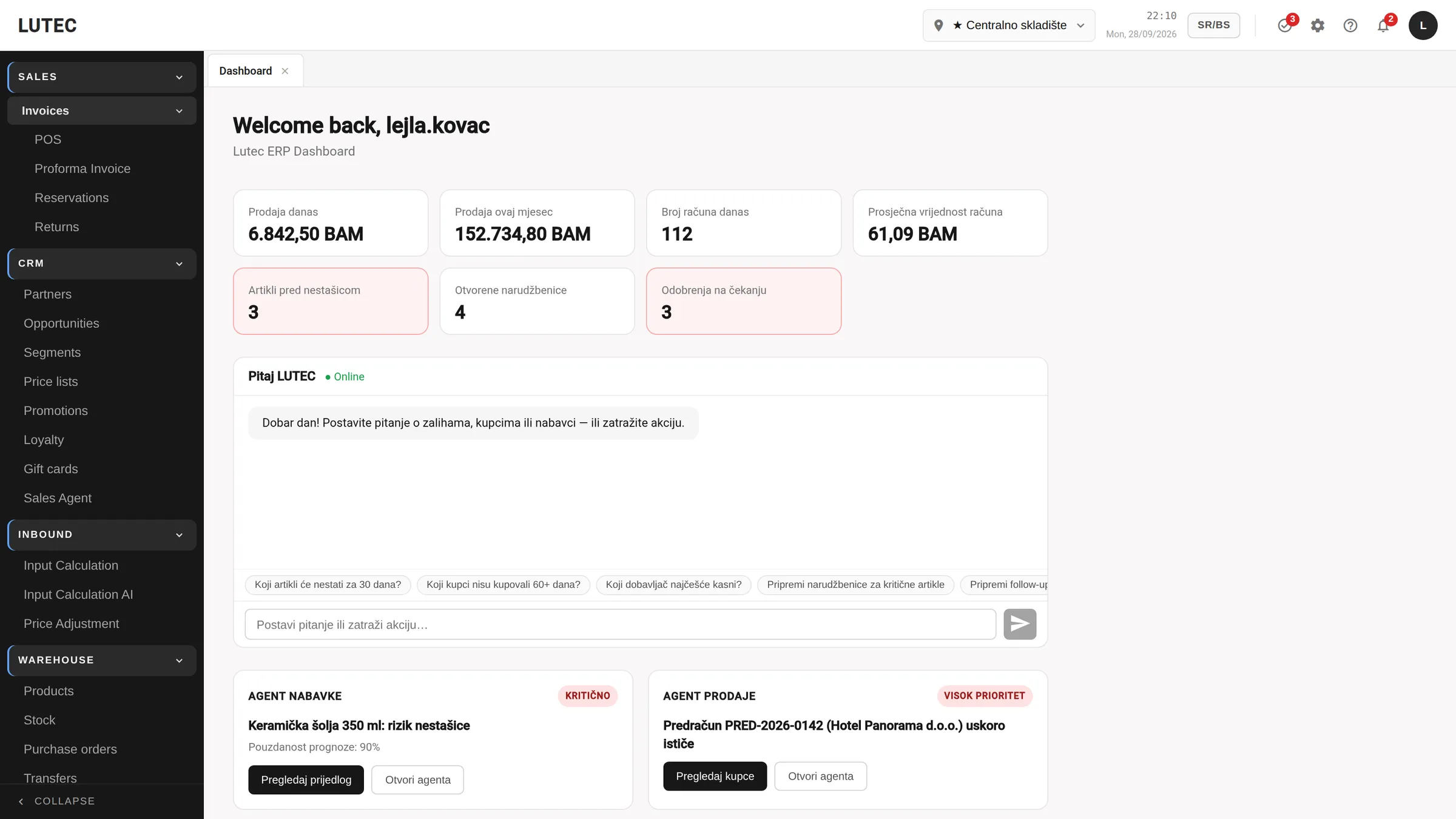 ERP dashboard with sales figures, stock warnings and agent cards.